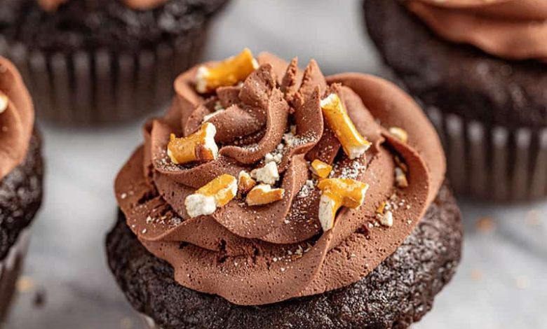 Chocolate Cupcakes with Peanut Butter Filling, Whipped Chocolate Ganache, and Crushed Pretzel